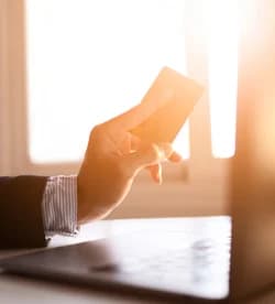 A person shaking hands with a mechanic